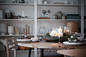 Christmas table decorations in Scandinavian-style dining room