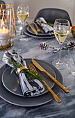Festive Christmas table set grey and gold colors