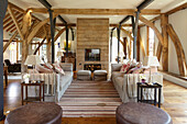 Living area in converted barn with wooden beams