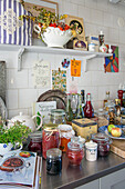 Kitchen shelf, preserving jars and country-style decoration