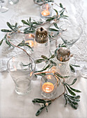 White Christmas table setting with garland
