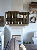 Living room with rustic vintage decor and grey sofa