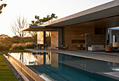 Inside-outside living space with canopied terrace and pool