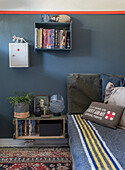 Reading area in the teenager's room with vintage decor and DIY shelves