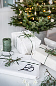 Christmas wrapped presents with fir branches