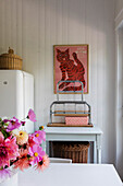 Nostalgic kitchen corner with retro poster and basket accessories