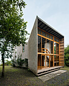 Modern house with timber and concrete façade in a rural setting