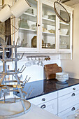 Kitchen unit with granite worktop and metal crockery rack