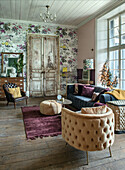 Living room with floral patterned wallpaper, antique double doors and velvet furniture