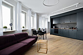 Open-plan kitchen, living and dining area in a modern flat