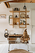 Retro school desk, wooden shelf and decorations