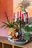 Candle holder with parrot, tropical plant and tiger head decoration
