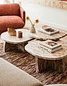 Marble coffee tables with decoration and books in the living room