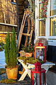 Winter decorations with lanterns and sledges in the outdoor area