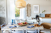 Dining room with table setting and Scandinavian decor
