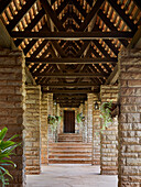 Covered walkway made of wood and stone, The Sorsbie Residence, Nairobi