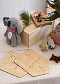 Handmade Christmas decoration with wooden signs, crocheted koala and animal figures