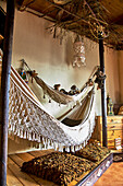 Macramé hammocks in a Moroccan-style indoor area