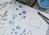 Watercolour art with blue anemones and bluebells