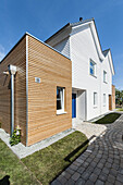 Holiday houses in a modern wood look at Heiligenhafen, Schleswig-Holstein, Baltic Sea, North Germany, Germany, with property release