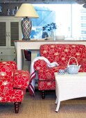 Floral upholstered chairs, wicker table