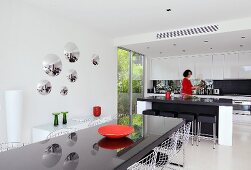 Woman in kitchen of Villa Bamboo, Southern France