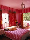 Red bedroom with balcony