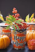 Paper cup with rowan berries (Halloween)