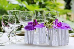 Purple orchids (table decoration)