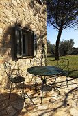 Garden furniture on a terrace of a country house, Umbria, Italy