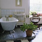 An open, old fashioned bathroom in an English country house
