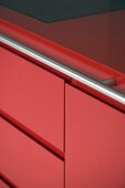 Close up of red kitchen unit