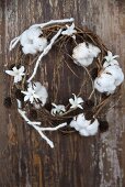 A wreath of alder and cotton with hyacinth flowers