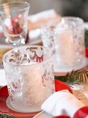 White windlights (Christmas table decoration)