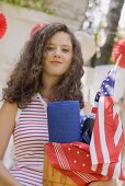Young woman at a 4th of July garden party (USA)
