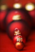 Assorted Christmas baubles in shades of red