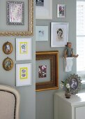 A collection of pictures in decorative frames