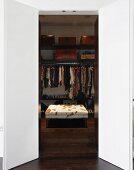 Open door leading to walk-in wardrobe