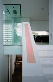 Staircase to glass shower cubicle & bedroom