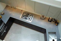 Top view of kitchen worktop, gas hob and sink