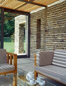 Tea break in modern living space with stone wall