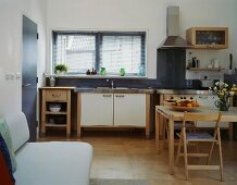 Modern, rustic kitchen with dining area