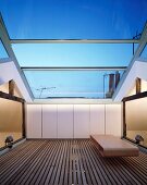 Roof terrace with sliding glass roof
