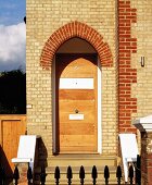 House entrance with arched door