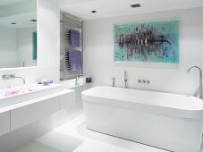 White designer bathroom with modern picture on wall