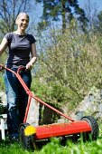 Lady mowing the lawn