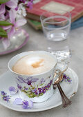 Cappuccino in floral cup