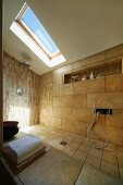 Designer bathroom in attic - tiled shower area with wall and floor tiles of different sizes