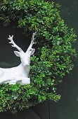 Wreath with deer figurine