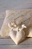 Angel and heart decoration on scented sachet